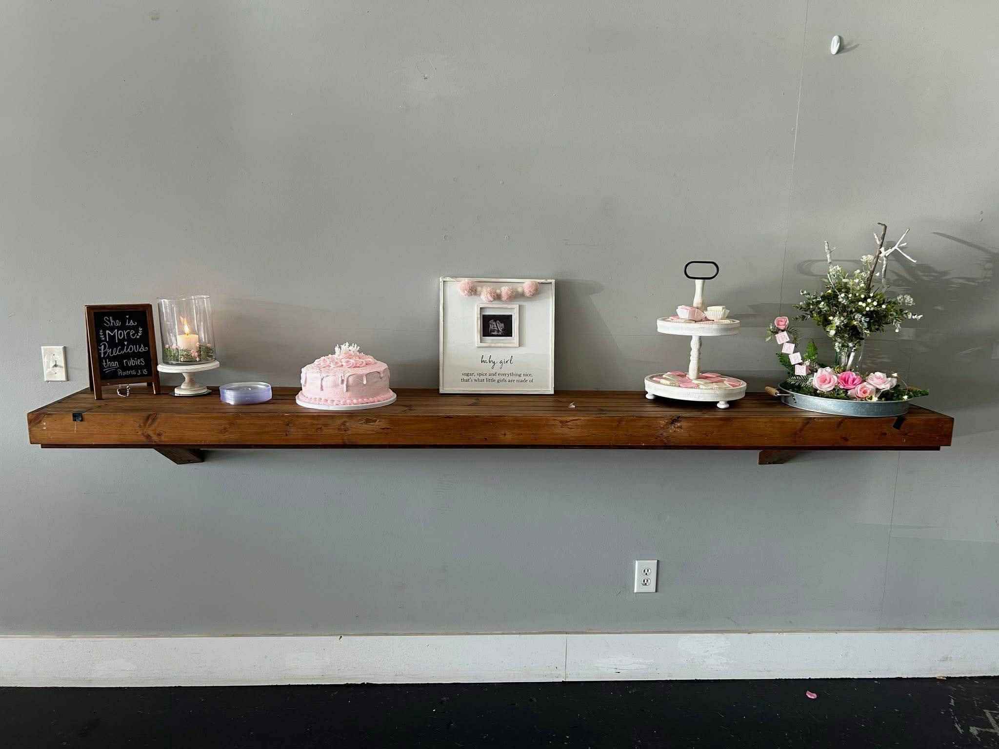 Pink baby girl shower dessert display at The 1889